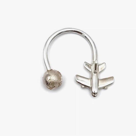 Vintage Tiffany Silver Airplane and Globe keychain.